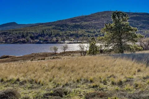 a view of a lake with a mountain in the background