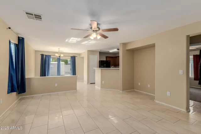 a view of a livingroom with a kitchen