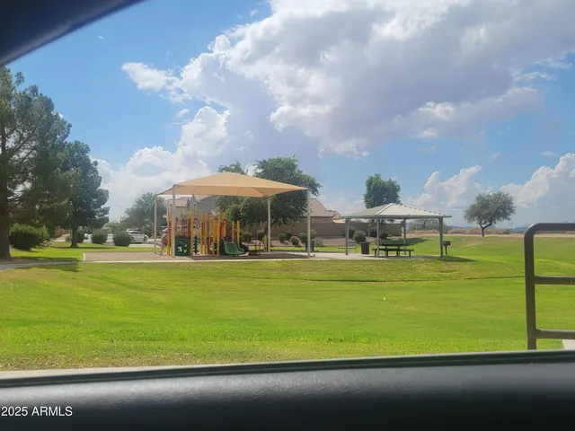a front view of a building with an ocean view