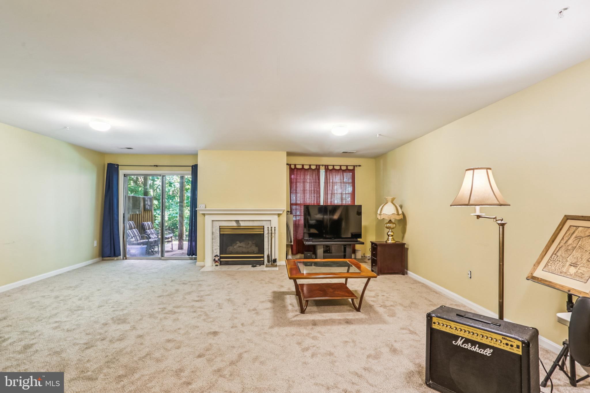 15129 Deer Valley Terrace Silver Spring, MD 20906 - Photo 17 of 30 Spacious living area with serene outdoor access.