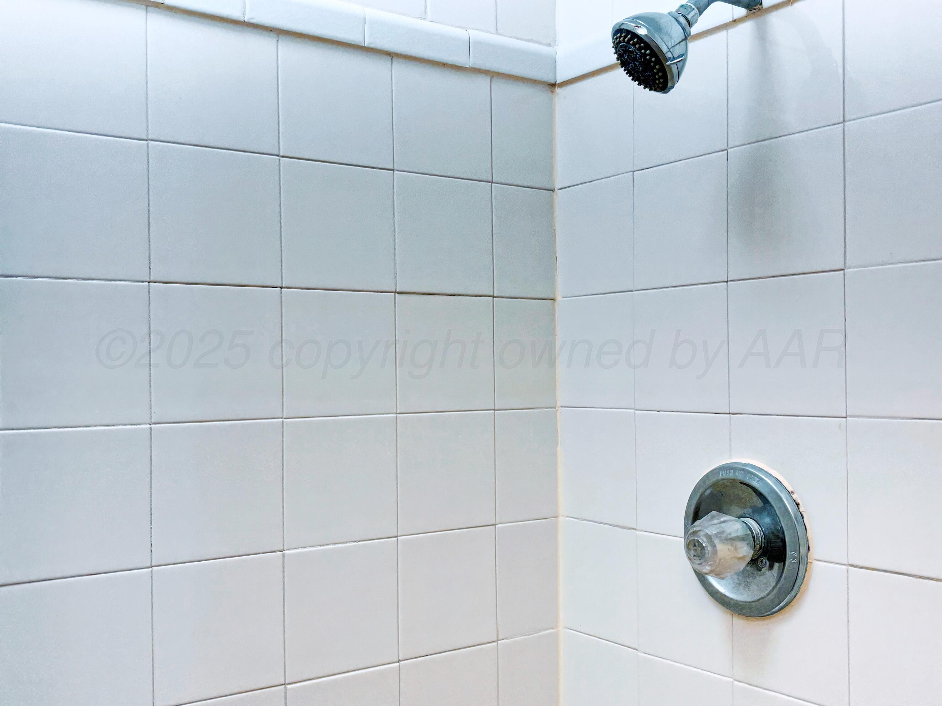 1510 South Indiana Street Perryton, TX 79070 - Photo 24 of 39 a bathroom with a sink and a vanity