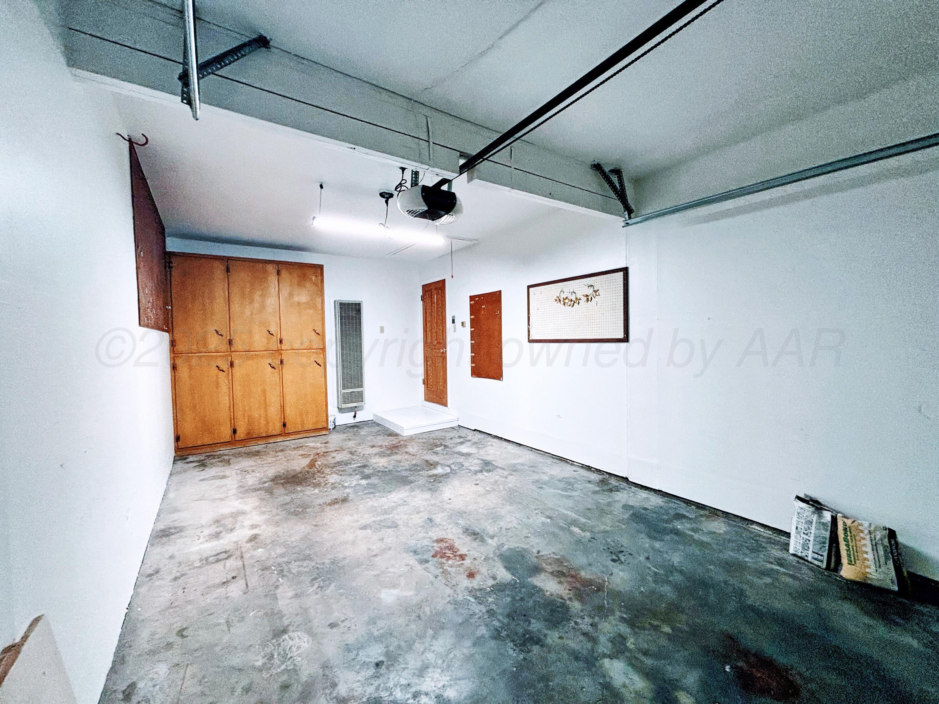 1510 South Indiana Street Perryton, TX 79070 - Photo 33 of 39 a view of empty room with wooden floor