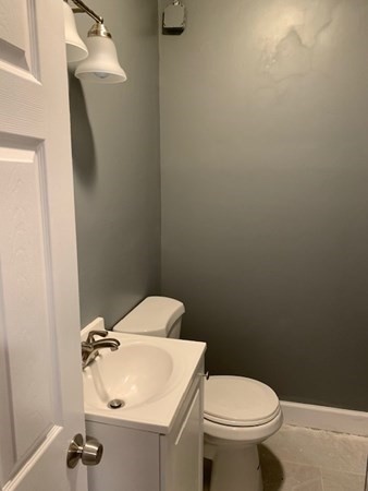 377 Park Avenue Worcester, MA 01610 - Photo 11 of 14 a bathroom with a sink and toilet