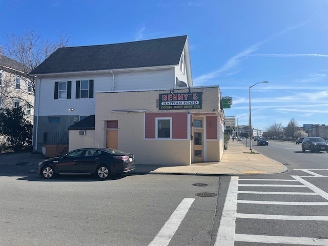 377 Park Avenue Worcester, MA 01610 - Photo 2 of 14 a front view of a house with a yard