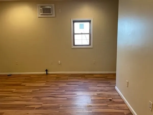 a kitchen with stainless steel appliances granite countertop a refrigerator and a stove