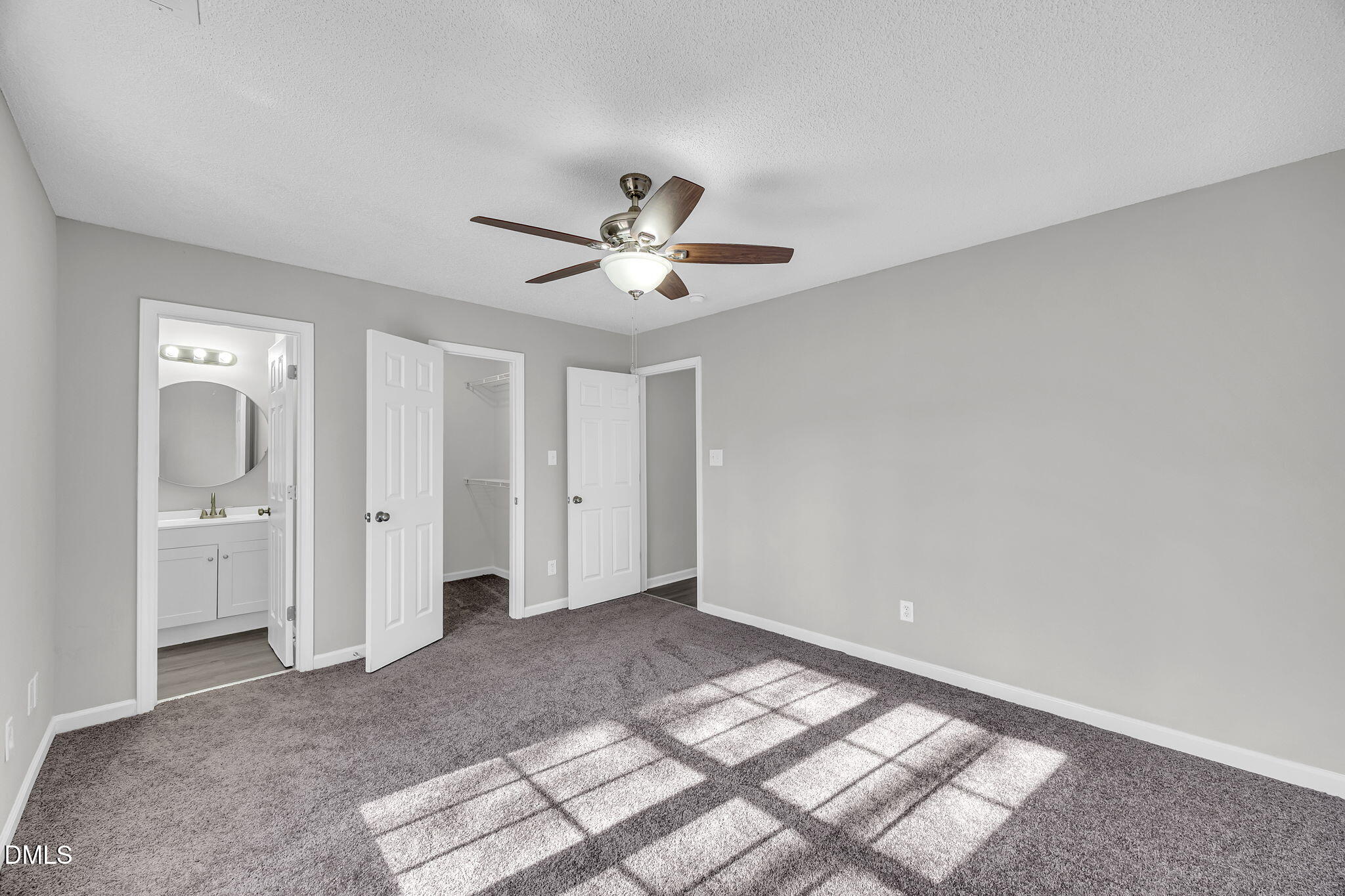 2231 Violet Bluff Court Raleigh, NC 27610 - Photo 12 of 16 a view of a livingroom with a ceiling fan and window
