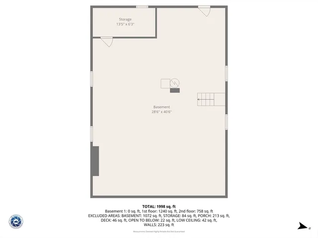 a picture of a room with a white wall and a refrigerator