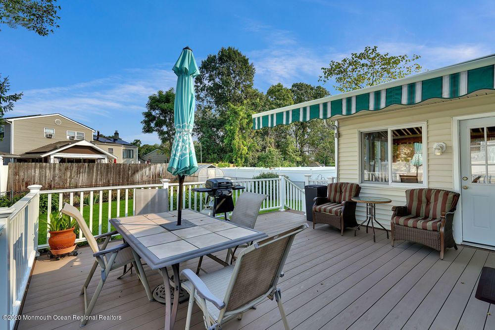 312 Emberly Road Brick, NJ 08723 - Photo 36 of 42 a view of a deck with furniture