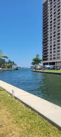 a view of swimming pool with a yard
