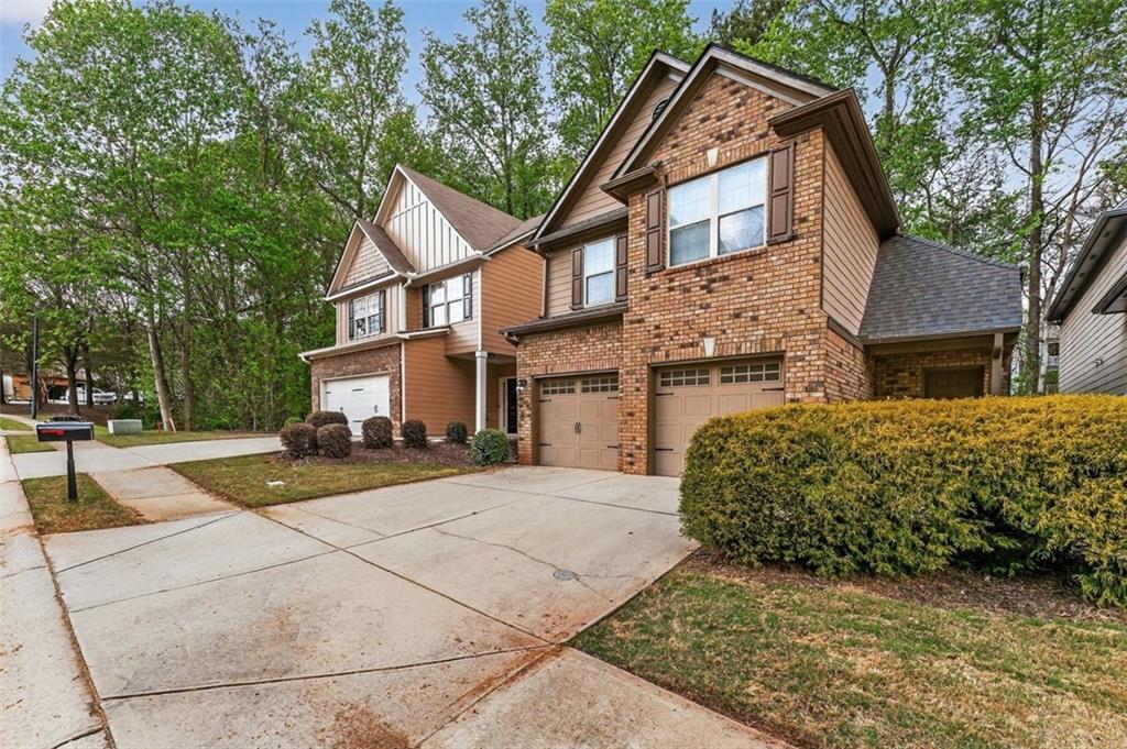 113 Tyson Woods Road Acworth, GA 30102 - Photo 3 of 37 a view of a house with a yard