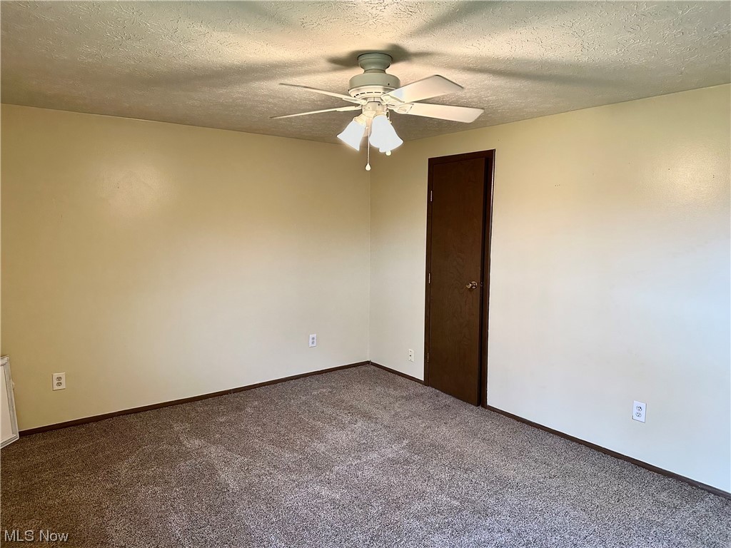 5221 Cline Road, Unit F Kent, OH 44240 - Photo 18 of 34 Main bedroom with door to walk in closet