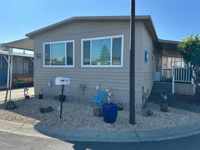 a front view of a house with porch