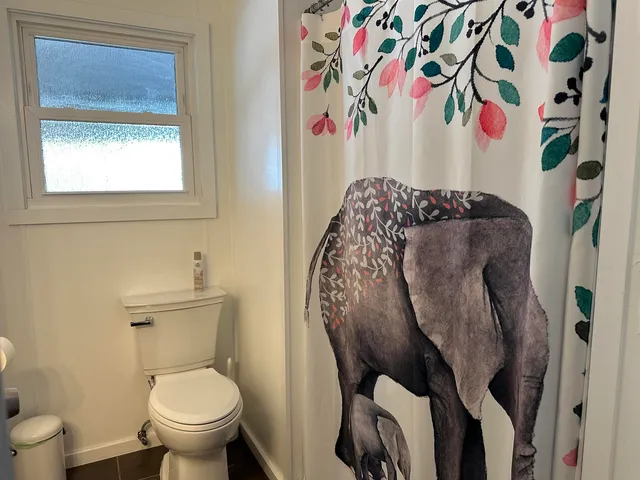 a bathroom with a toilet and a sink