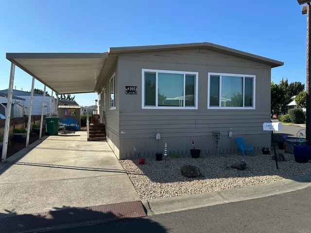 a white house with a outdoor space