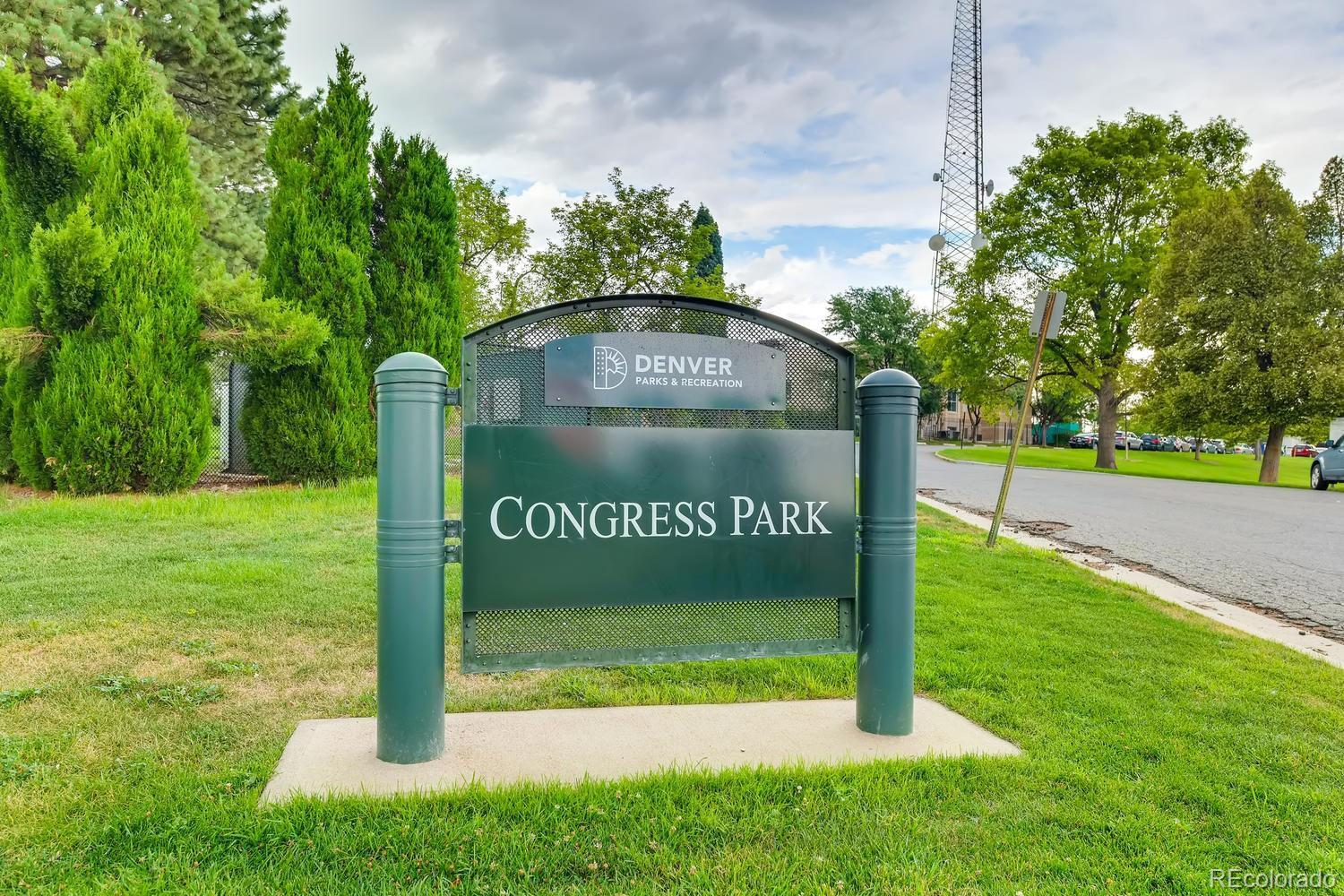1028 Cook Street Denver, CO 80206 - Photo 39 of 40 a view of a park with welcome board