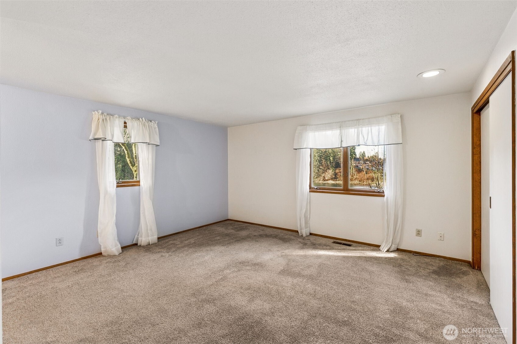 5221 Blvd Ext Road Southeast Olympia, WA 98501 - Photo 11 of 25 an empty room with windows