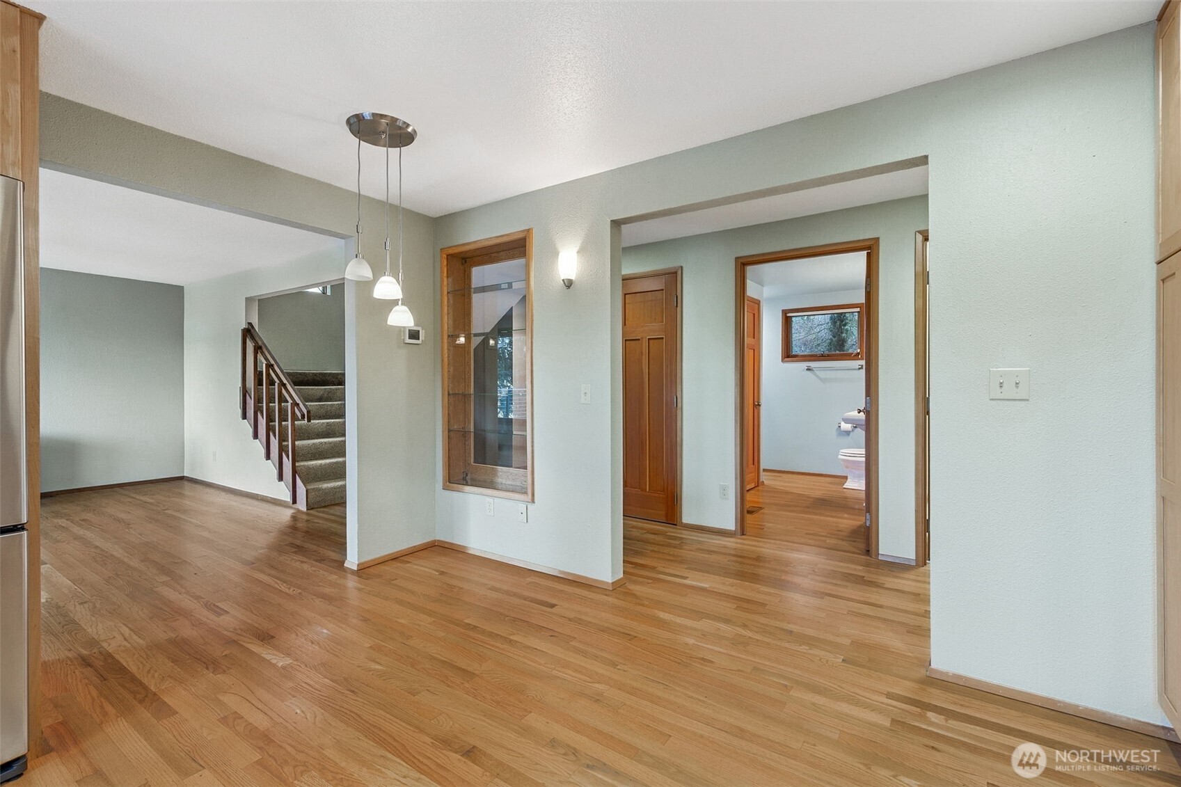 5221 Blvd Ext Road Southeast Olympia, WA 98501 - Photo 18 of 25 a view of a hallway with wooden floor and closet
