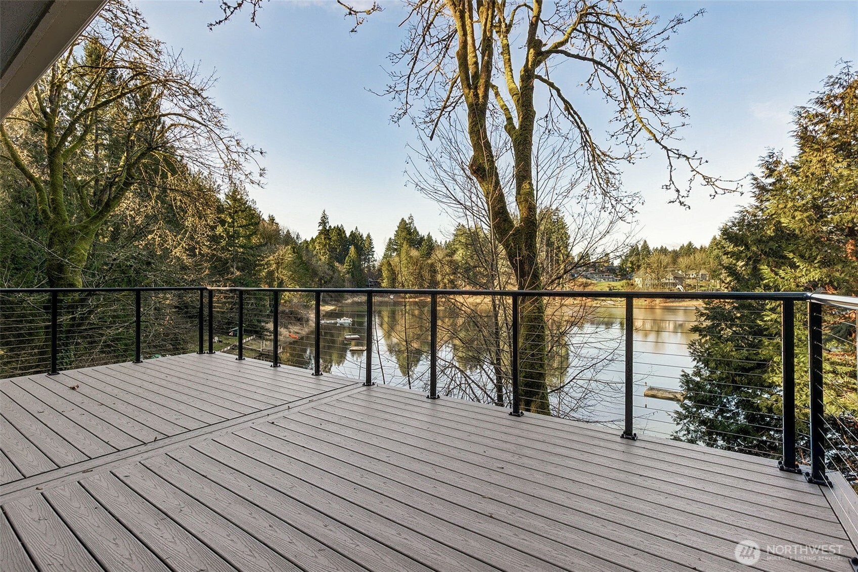5221 Blvd Ext Road Southeast Olympia, WA 98501 - Photo 4 of 25 a view of a balcony with wooden floor and fence