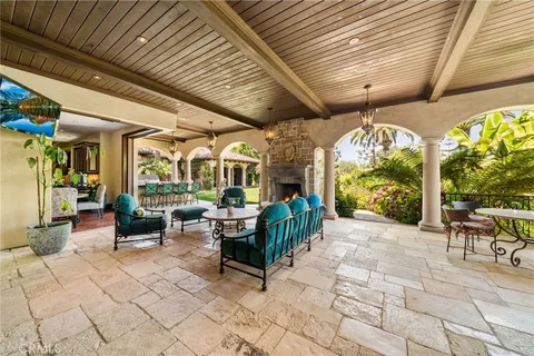 a view of a chairs and tables in patio