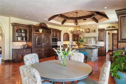 a bedroom with a bed and a fireplace