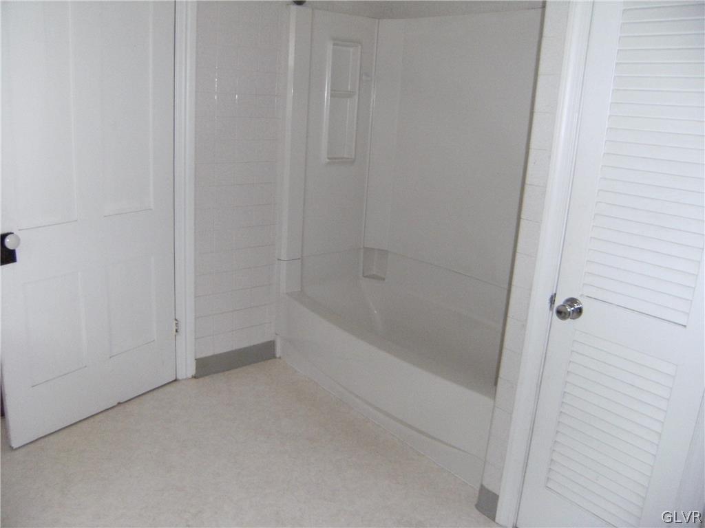 1115 Main Street Slatington, PA 18080 - Photo 16 of 19 a bathroom with a bathtub