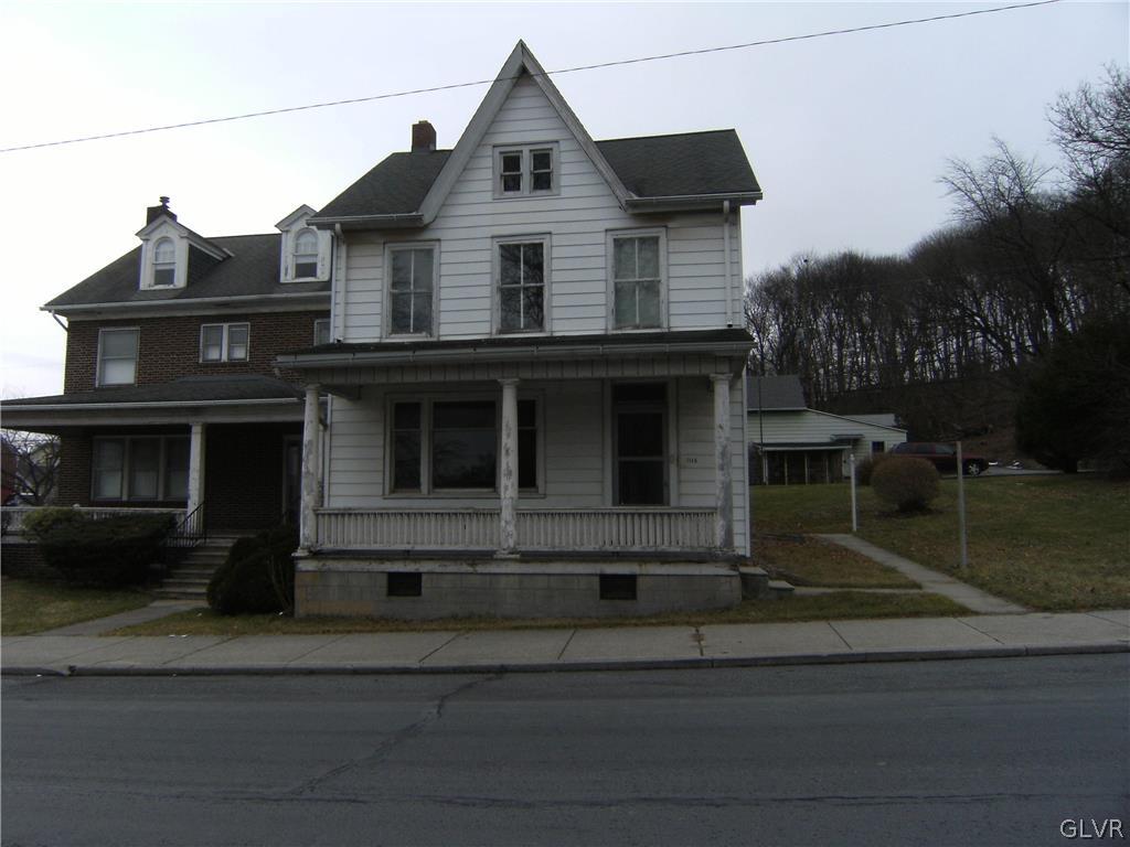 1115 Main Street Slatington, PA 18080 - Photo 2 of 19 a front view of a house with a yard