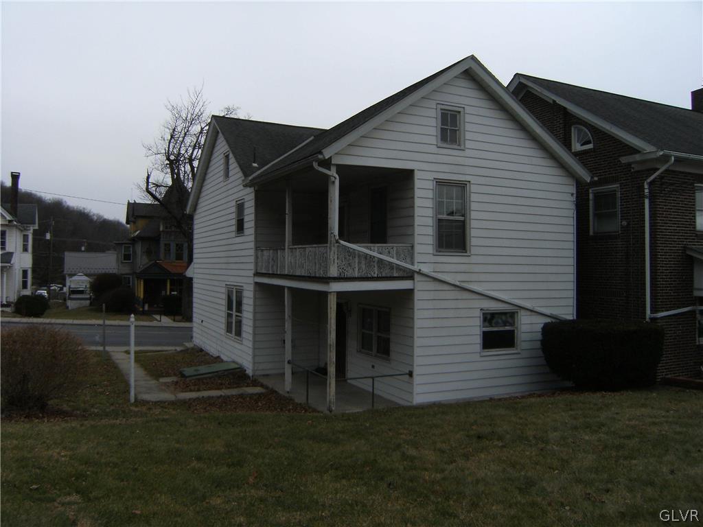 1115 Main Street Slatington, PA 18080 - Photo 4 of 19 a front view of house with a garden