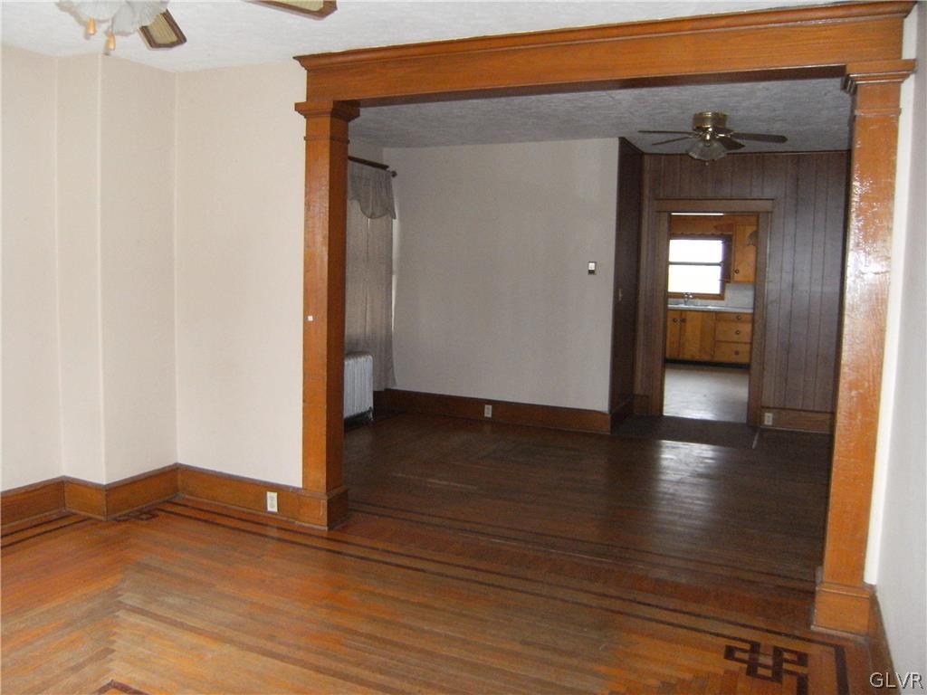 1115 Main Street Slatington, PA 18080 - Photo 6 of 19 a view of a hallway with wooden floor