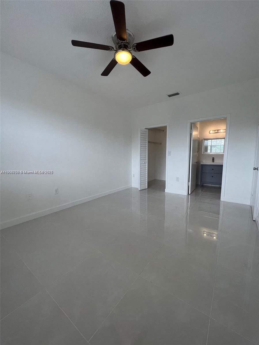 2001 Northwest 96th Terrace, Unit 10C Pembroke Pines, FL 33024 - Photo 6 of 10 an empty room