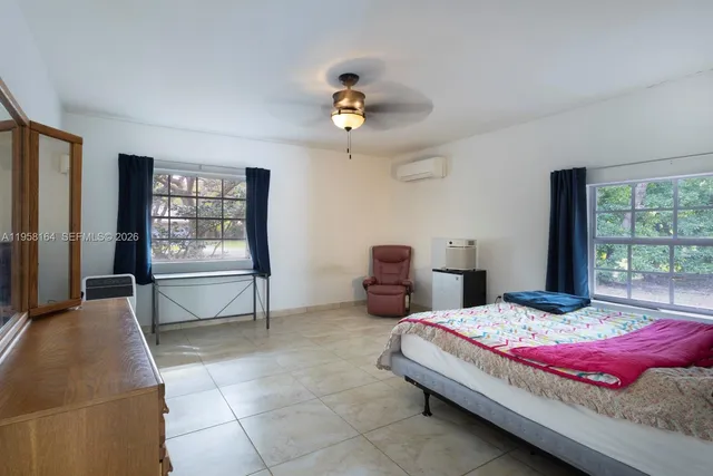 a view of a swimming pool and a yard