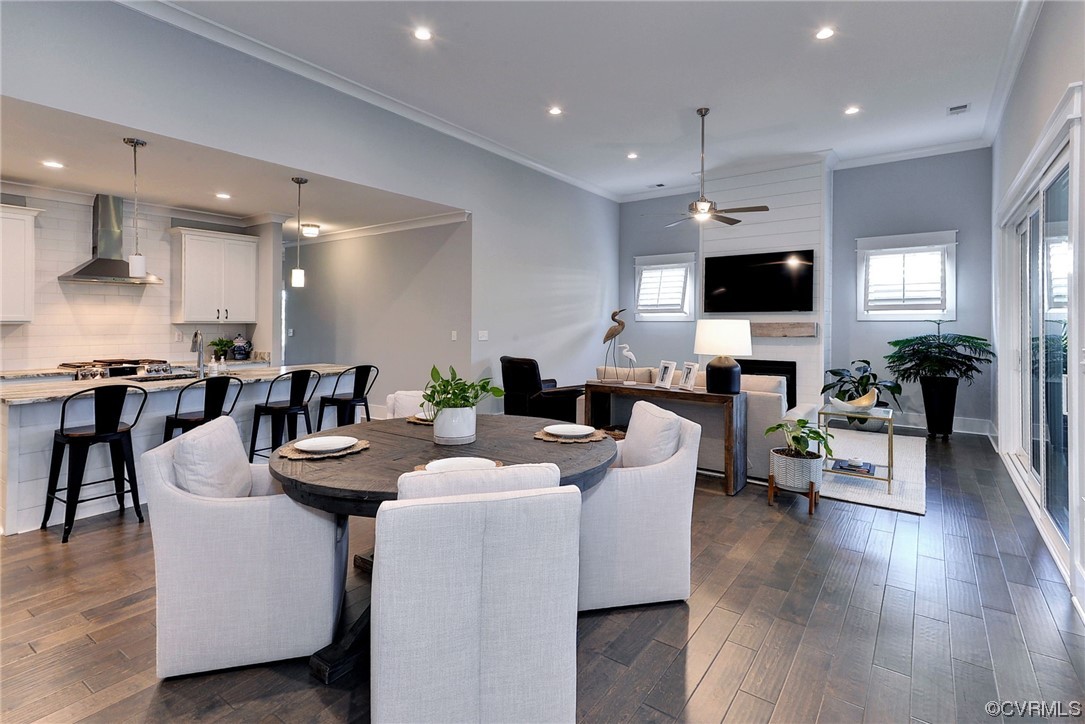 178 Old Course Loop Cape Charles, VA 23310 - Photo 17 of 49 a living room with furniture kitchen view and a flat screen tv