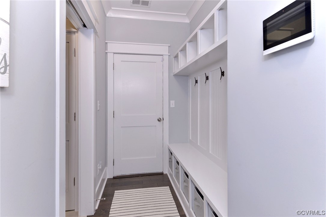 178 Old Course Loop Cape Charles, VA 23310 - Photo 18 of 49 a view of a hallway with wooden floor and entryway