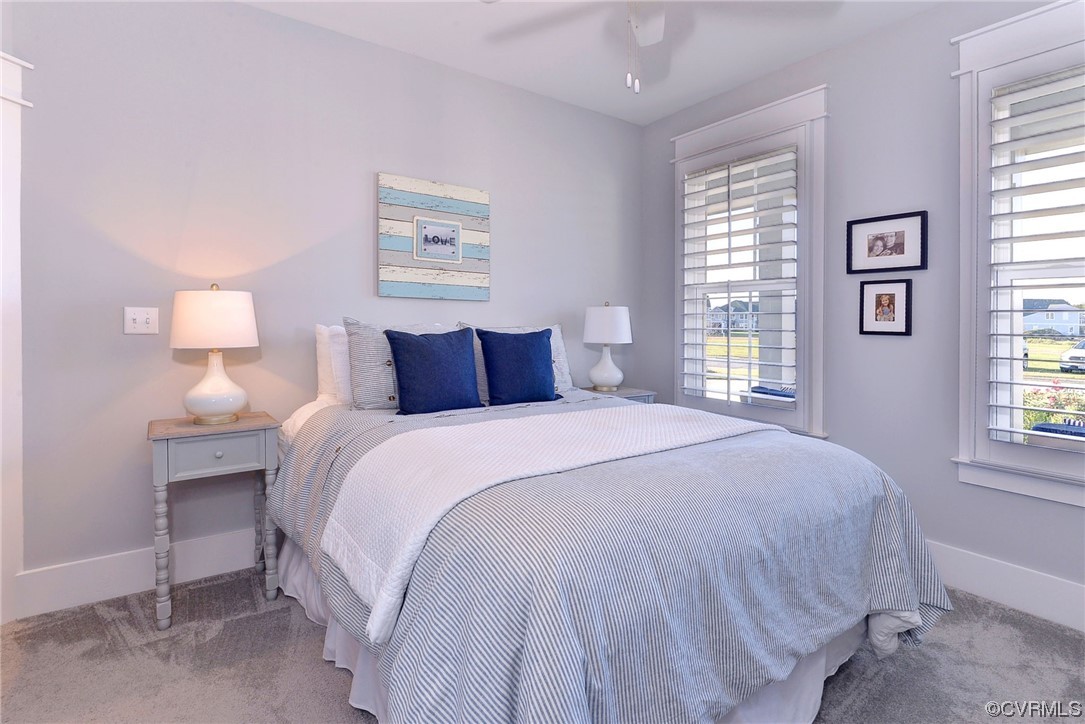 178 Old Course Loop Cape Charles, VA 23310 - Photo 29 of 49 a bedroom with a bed and a window