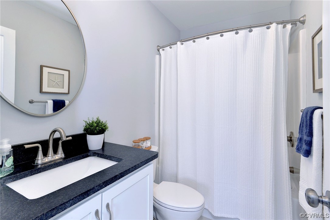 178 Old Course Loop Cape Charles, VA 23310 - Photo 31 of 49 a bathroom with a sink toilet and shower