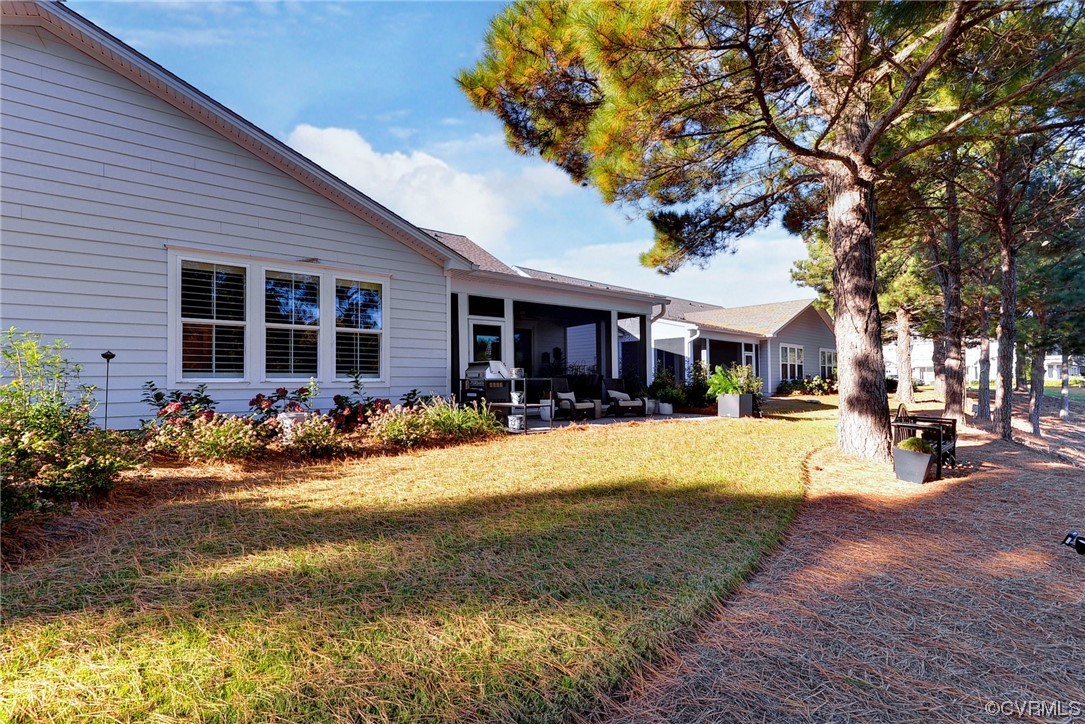178 Old Course Loop Cape Charles, VA 23310 - Photo 36 of 49 a front view of a house with yard patio and swimming pool