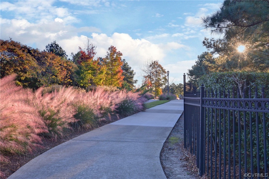 178 Old Course Loop Cape Charles, VA 23310 - Photo 41 of 49 a view of a pathway with a wrought fence