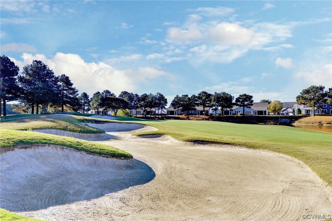 178 Old Course Loop Cape Charles, VA 23310 - Photo 42 of 49 a view of swimming pool with outdoor seating and yard in back