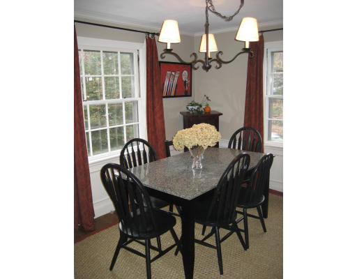 48 Payson Road Brookline, MA 02467 - Photo 5 of 15 a dining room with furniture and chandelier