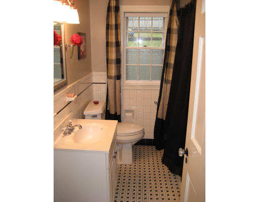 48 Payson Road Brookline, MA 02467 - Photo 10 of 15 a bathroom with a sink a toilet and shower