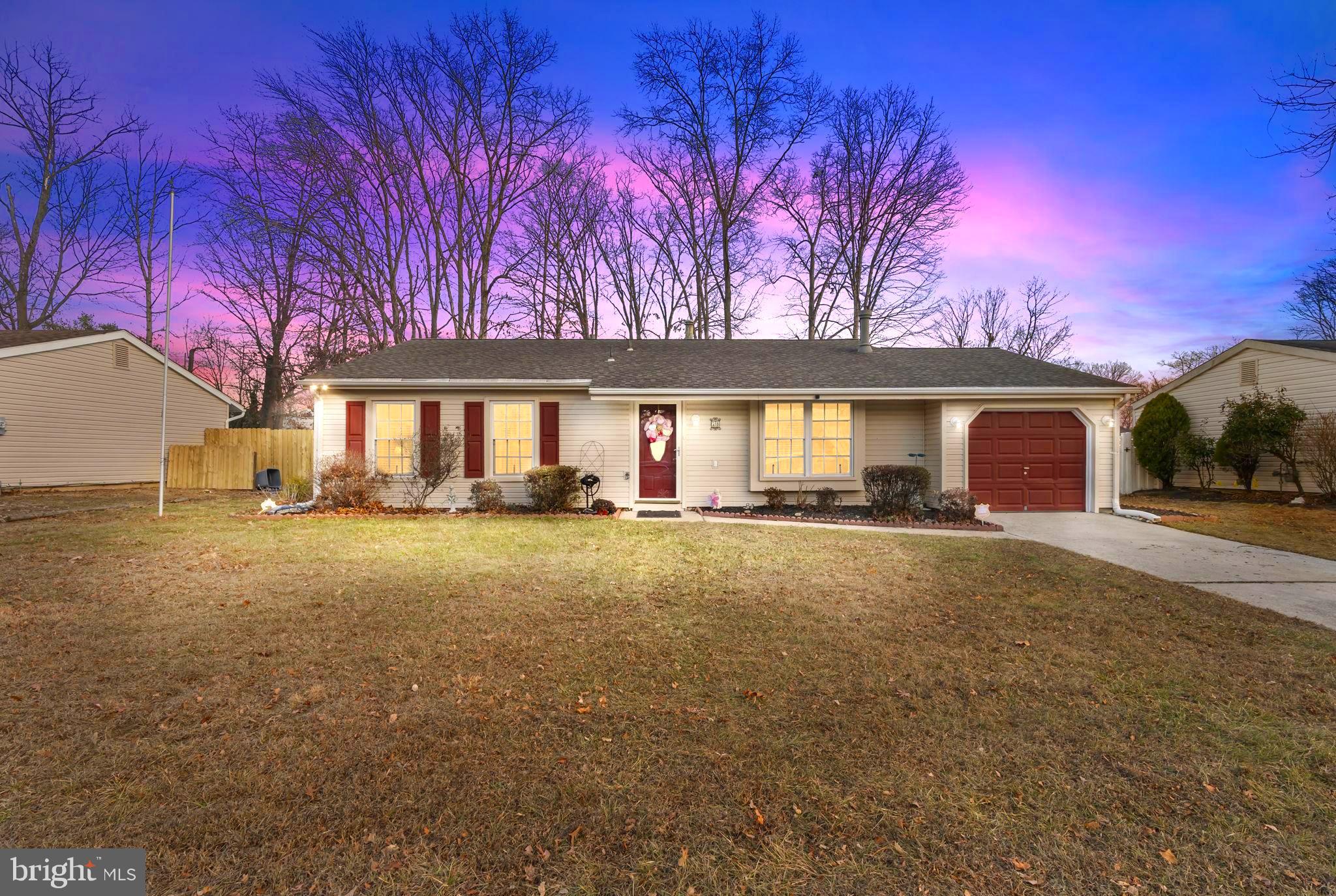 78 Lupus Lane Sewell, NJ 08080 - Photo 1 of 45 a view of a house with a yard and garage
