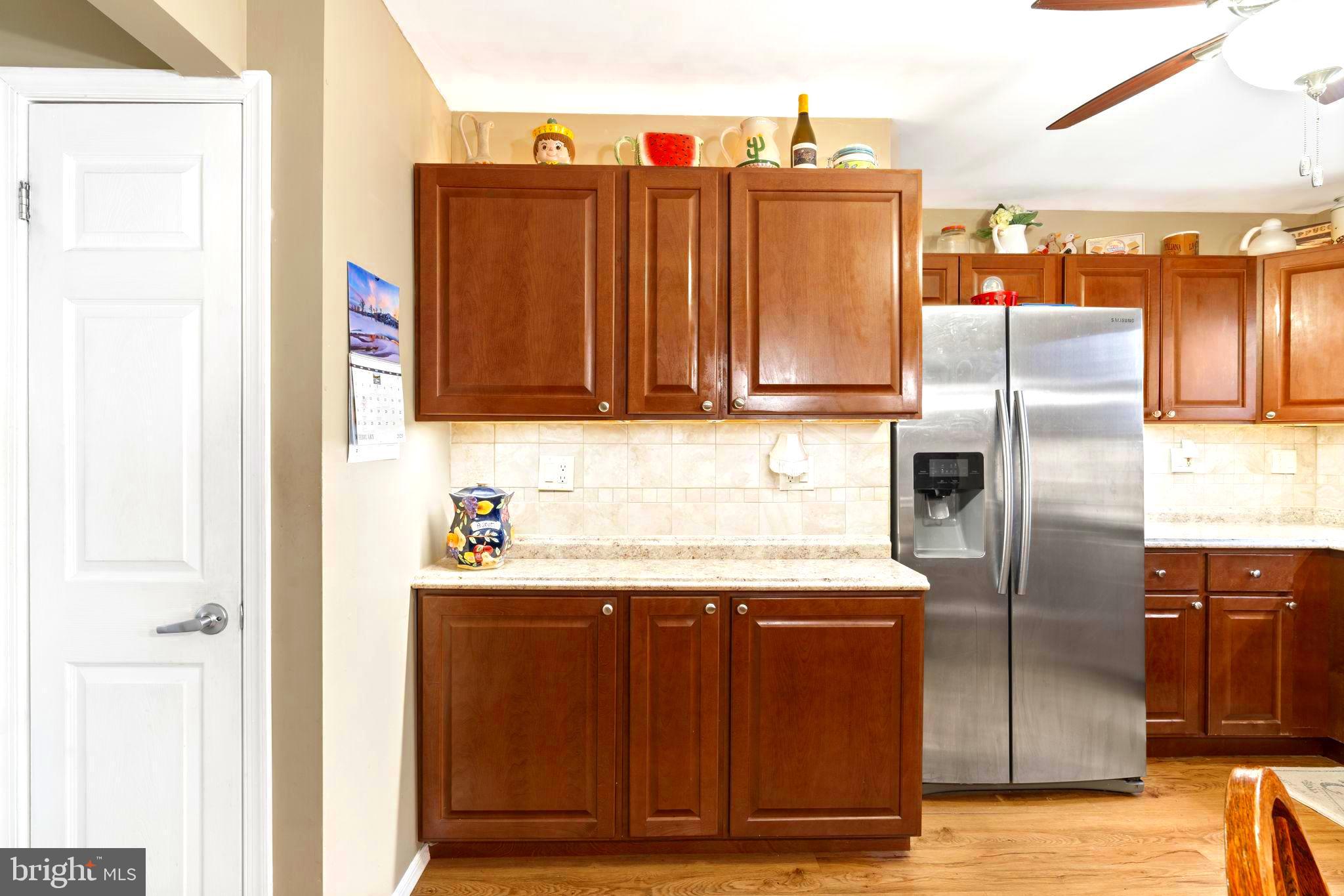 78 Lupus Lane Sewell, NJ 08080 - Photo 11 of 45 a kitchen with stainless steel appliances granite countertop a refrigerator and a sink