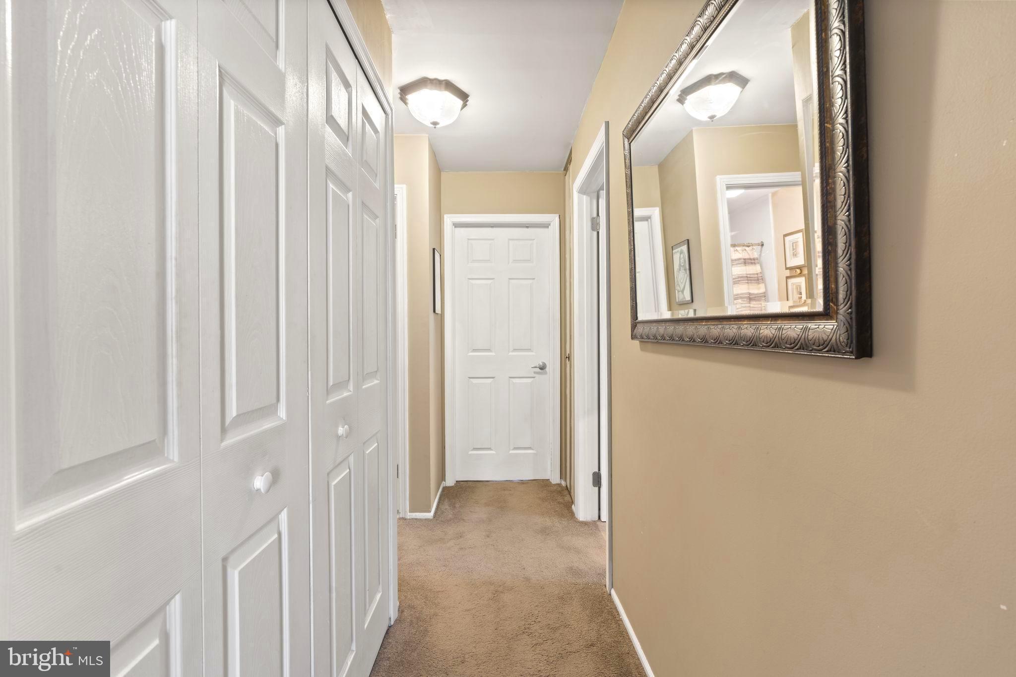 78 Lupus Lane Sewell, NJ 08080 - Photo 16 of 45 a view of a hallway with windows