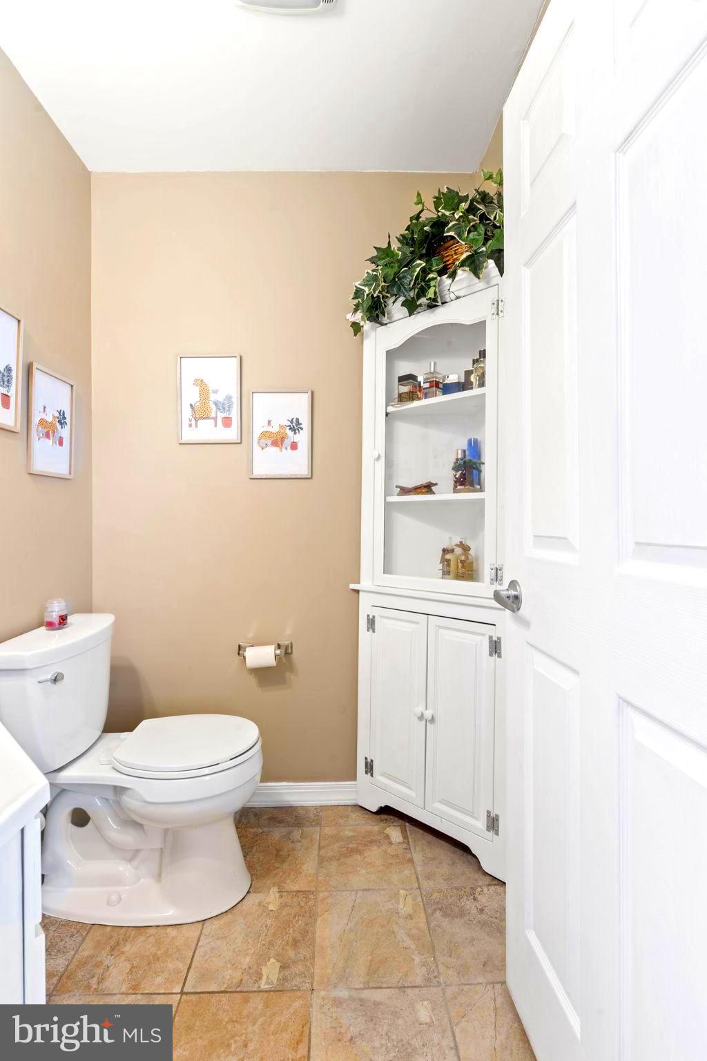 78 Lupus Lane Sewell, NJ 08080 - Photo 26 of 45 a bathroom with a toilet sink and mirror