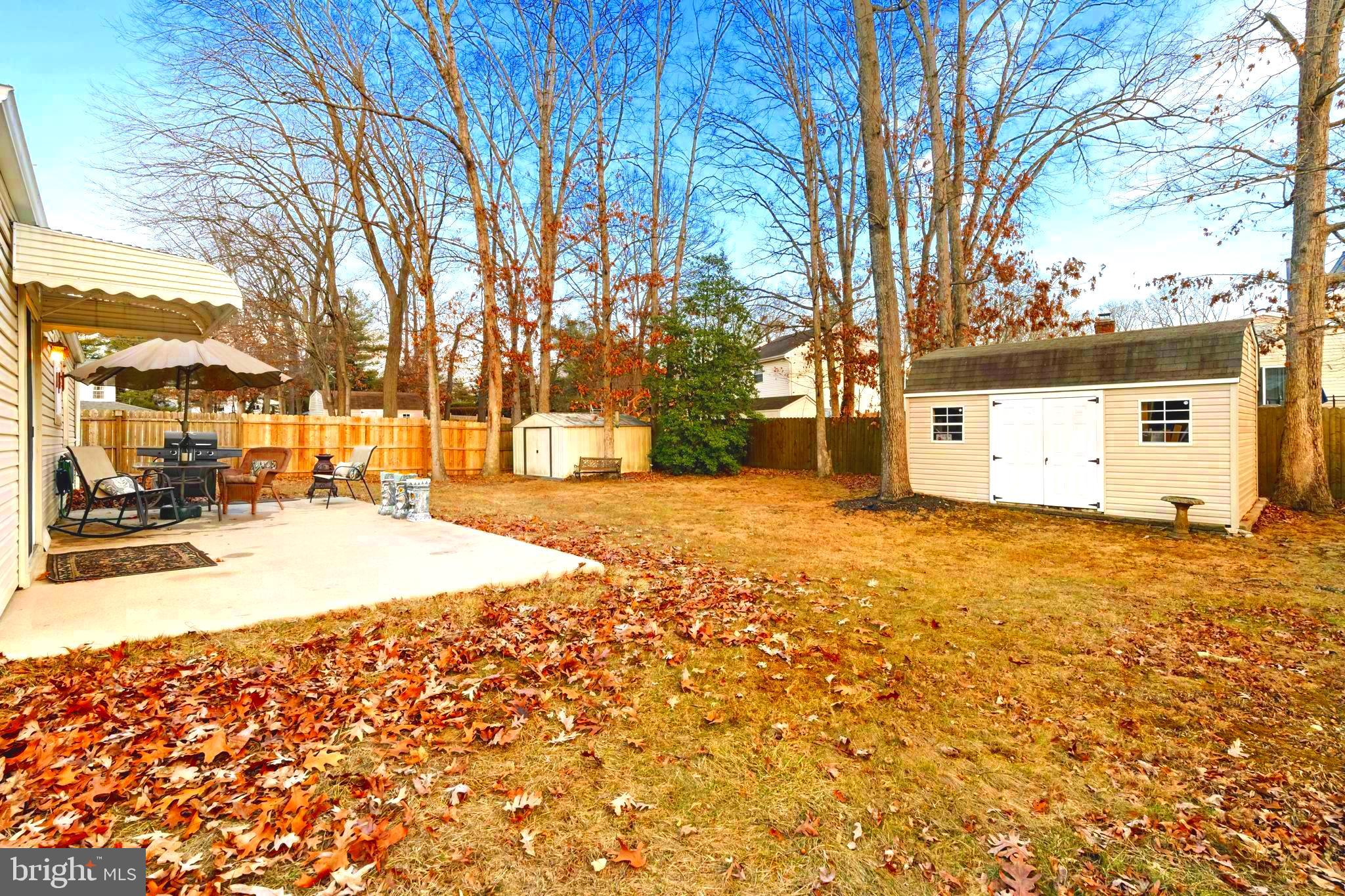 78 Lupus Lane Sewell, NJ 08080 - Photo 32 of 45 a view of a yard with snow on the road