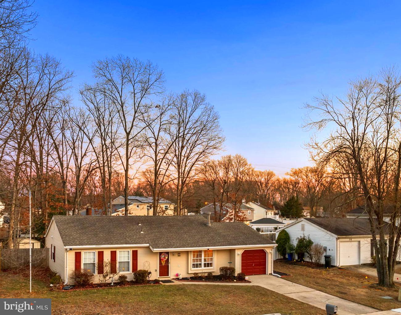 78 Lupus Lane Sewell, NJ 08080 - Photo 42 of 45 a view of residential houses with yard and trees