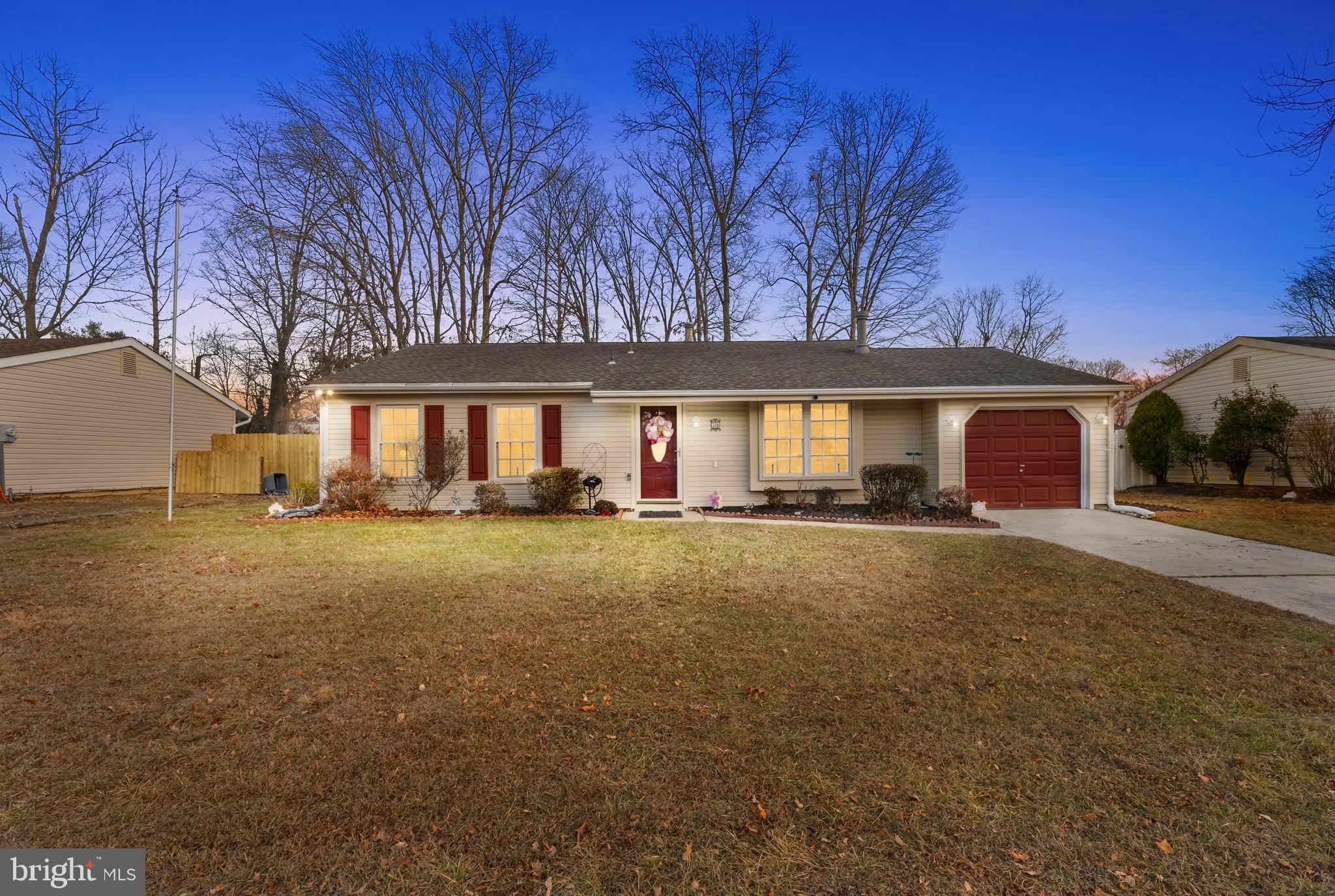 78 Lupus Lane Sewell, NJ 08080 - Photo 43 of 45 a view of a house with a yard and garage