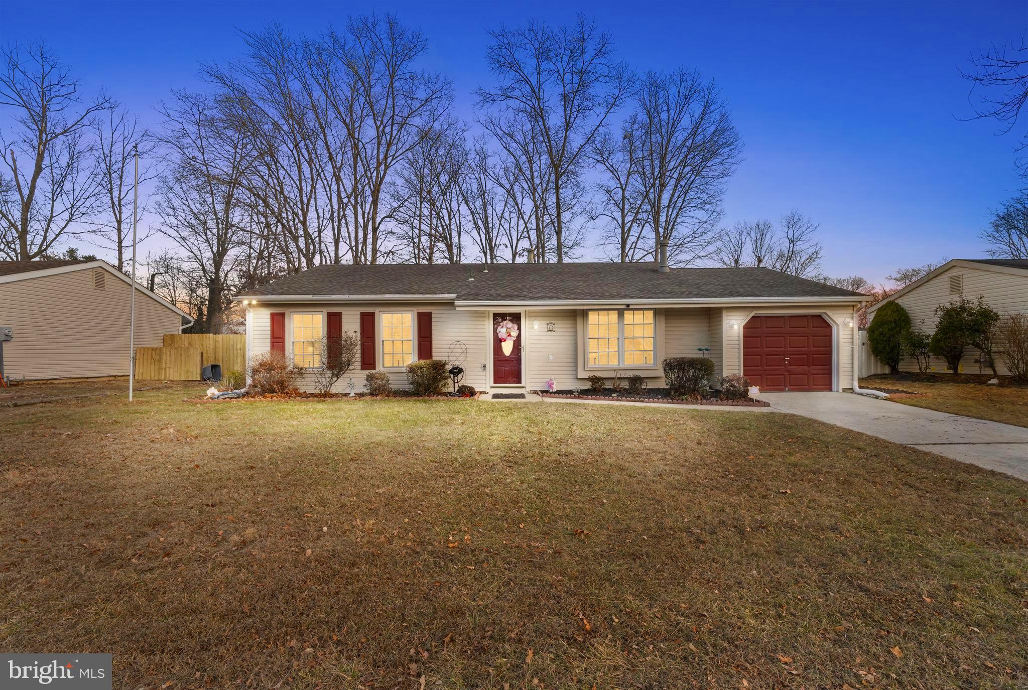 78 Lupus Lane Sewell, NJ 08080 - Photo 44 of 45 a view of a house with a yard and garage