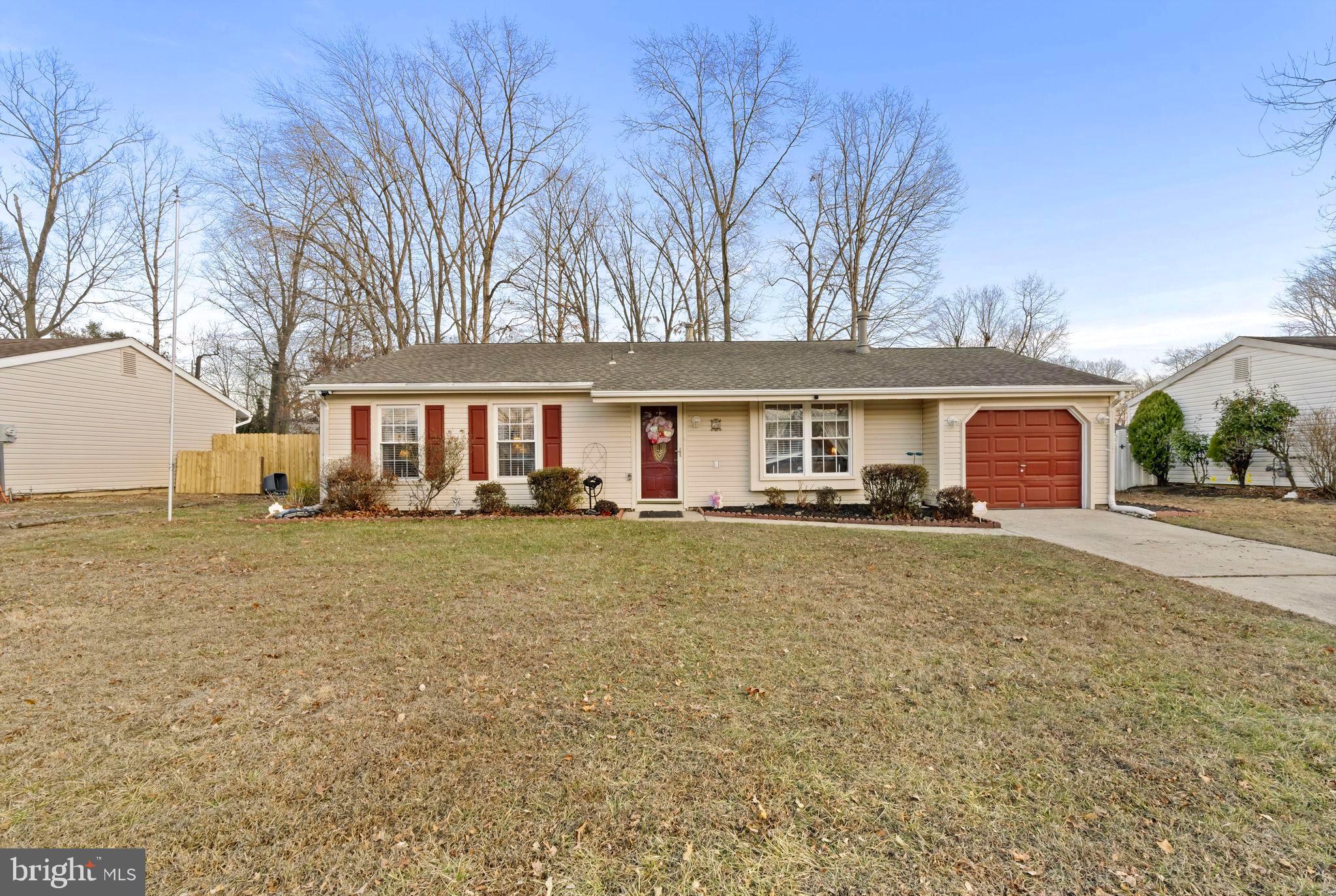 78 Lupus Lane Sewell, NJ 08080 - Photo 45 of 45 a front view of a house with a garden