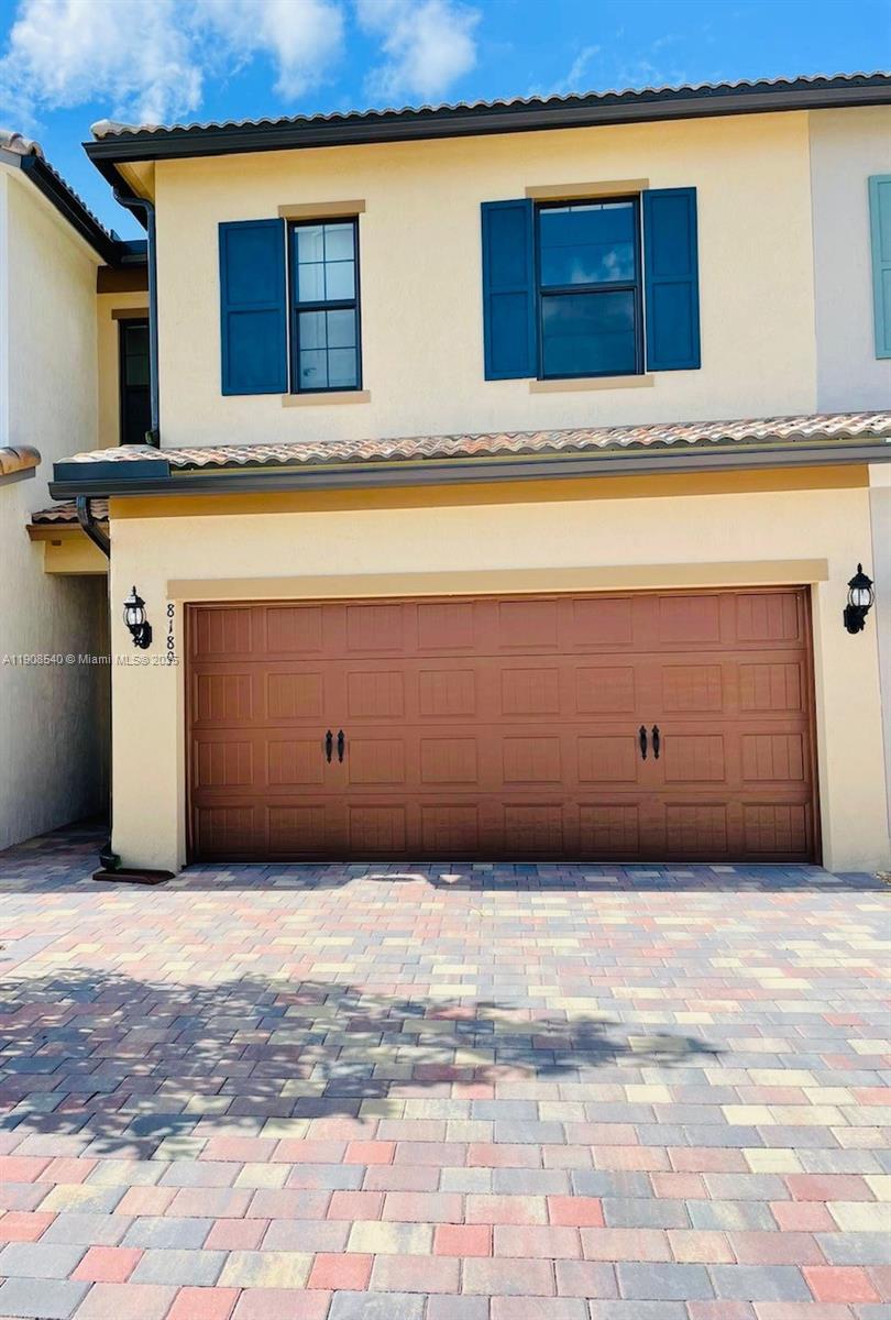 8189 Cinch Way, Unit 8189 Lake Worth, FL 33467 - Photo 4 of 11 a view of front door of house