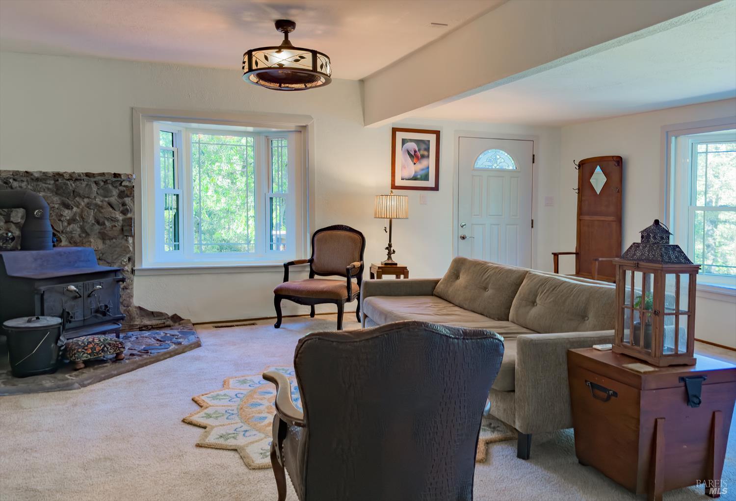5845 Austin Creek Road Cazadero, CA 95421 - Photo 12 of 26 a living room with furniture and a window